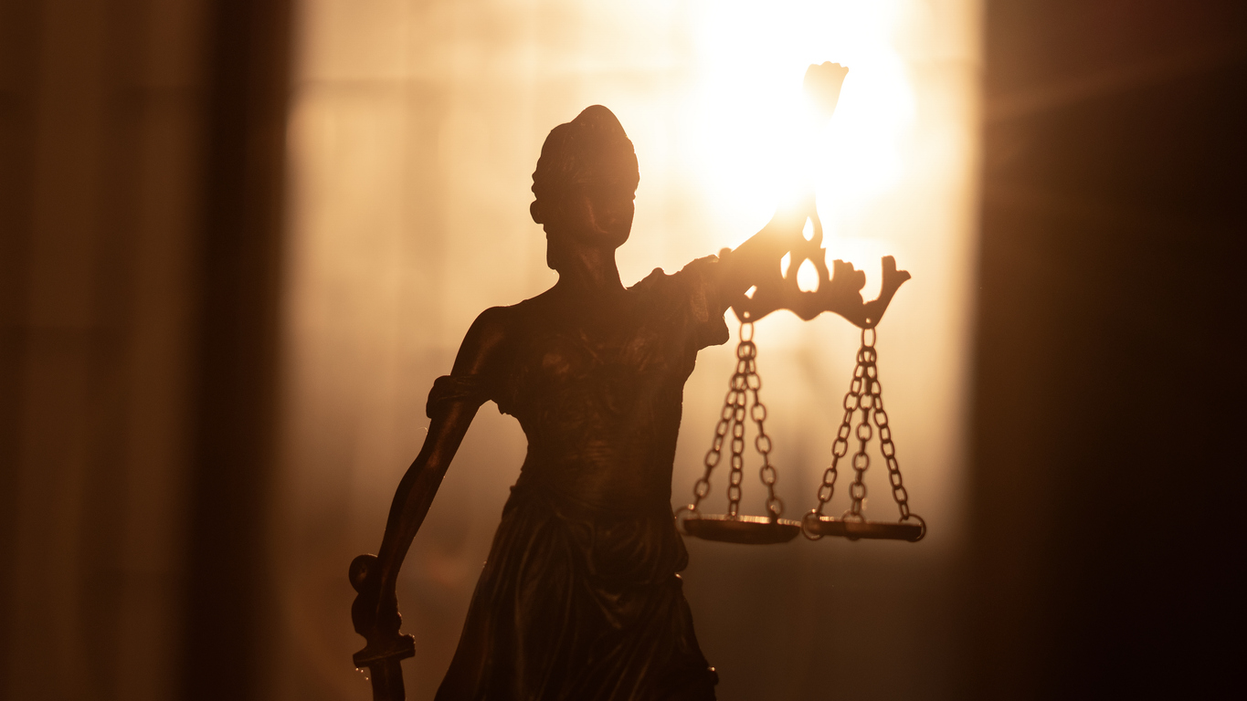 Statue of Lady Justice. Symbol of fair treatment under law first step act time credits supervised release